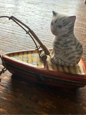 Limoges Hand-Painted White and Gray Cat on Red Boat Figurine